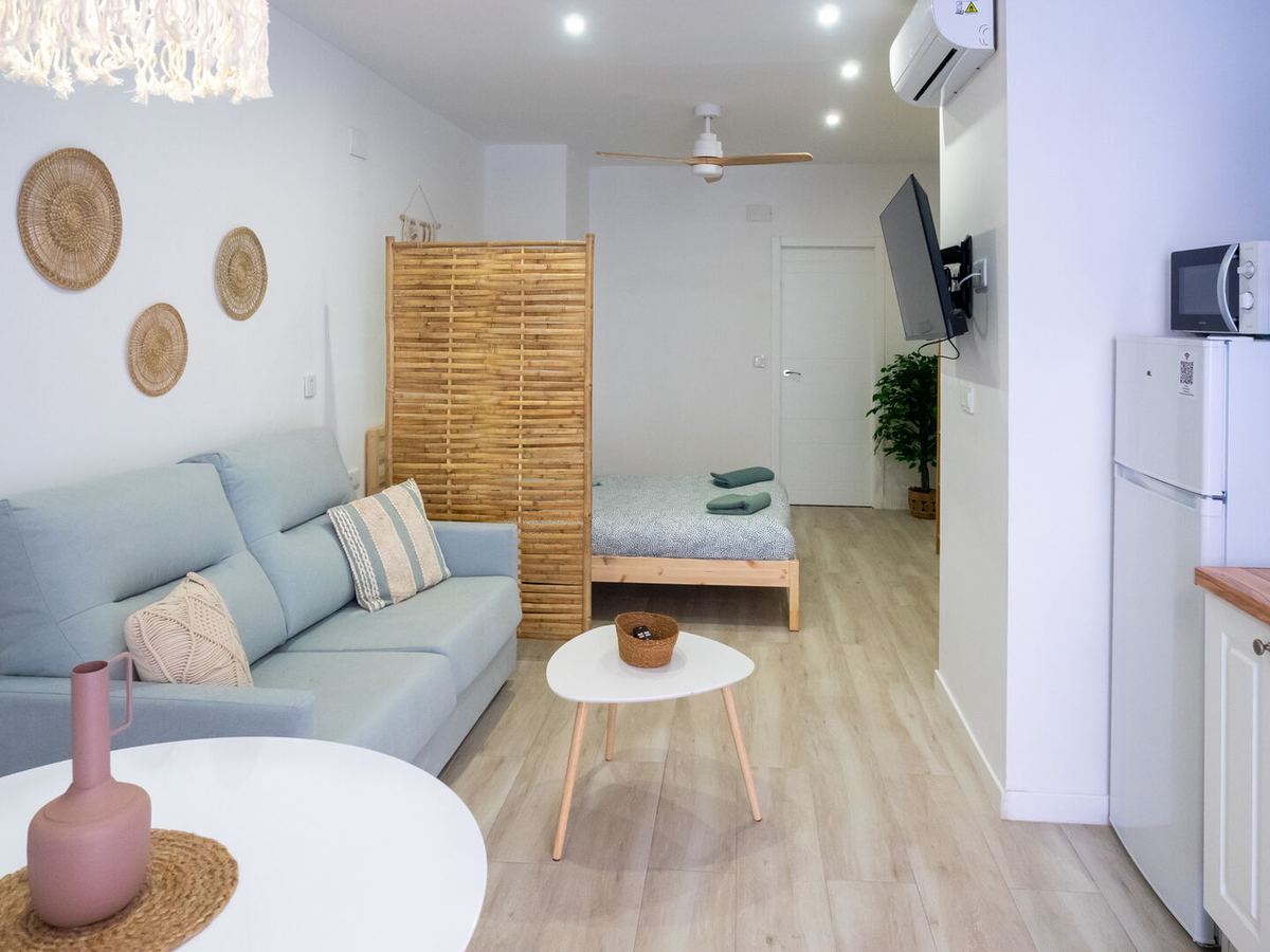 Living room with sofa bed and table