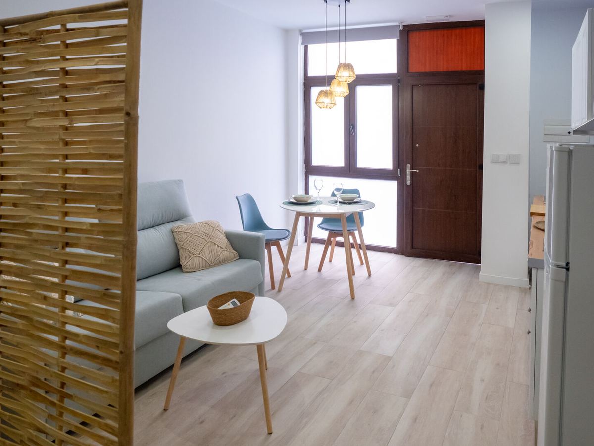 Living room with sofa bed and table