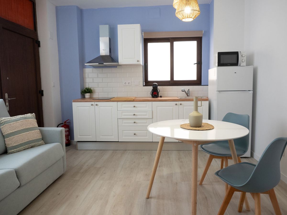 Living room with sofa bed and table
