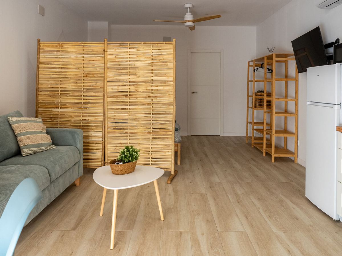 Living room with sofa bed and table